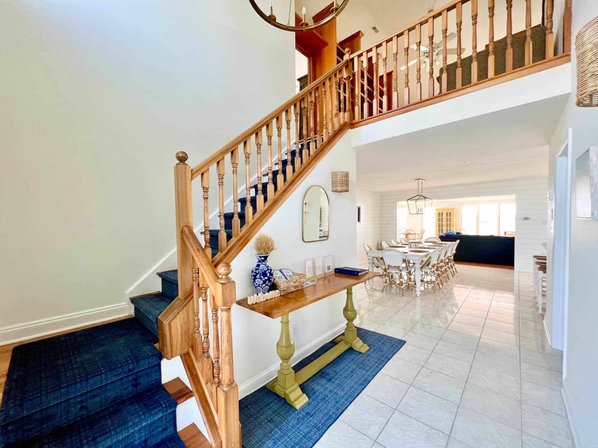 24 Ocean Drive West Brigantine, NJ 08203 - Photo 5 of 48 a living room with couches and dining table with wooden floor