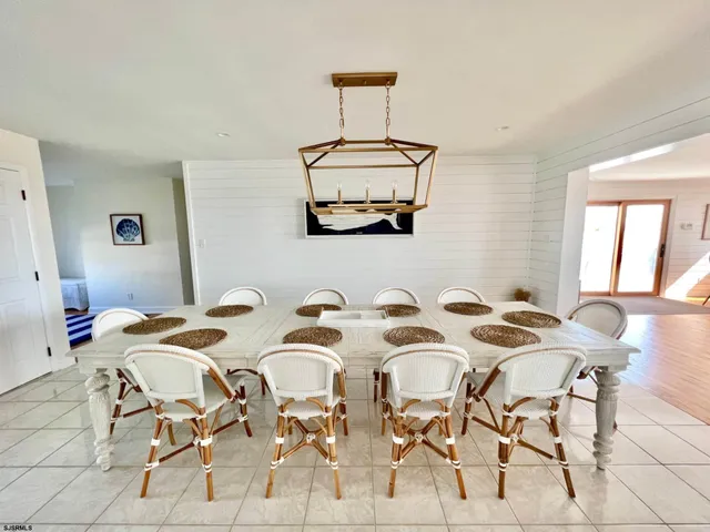 a view of a dining room a livingroom and furniture