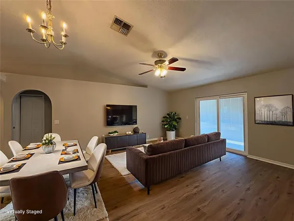 a view of livingroom with ceiling fan