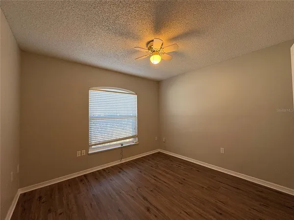 a view of a livingroom with wooden floor