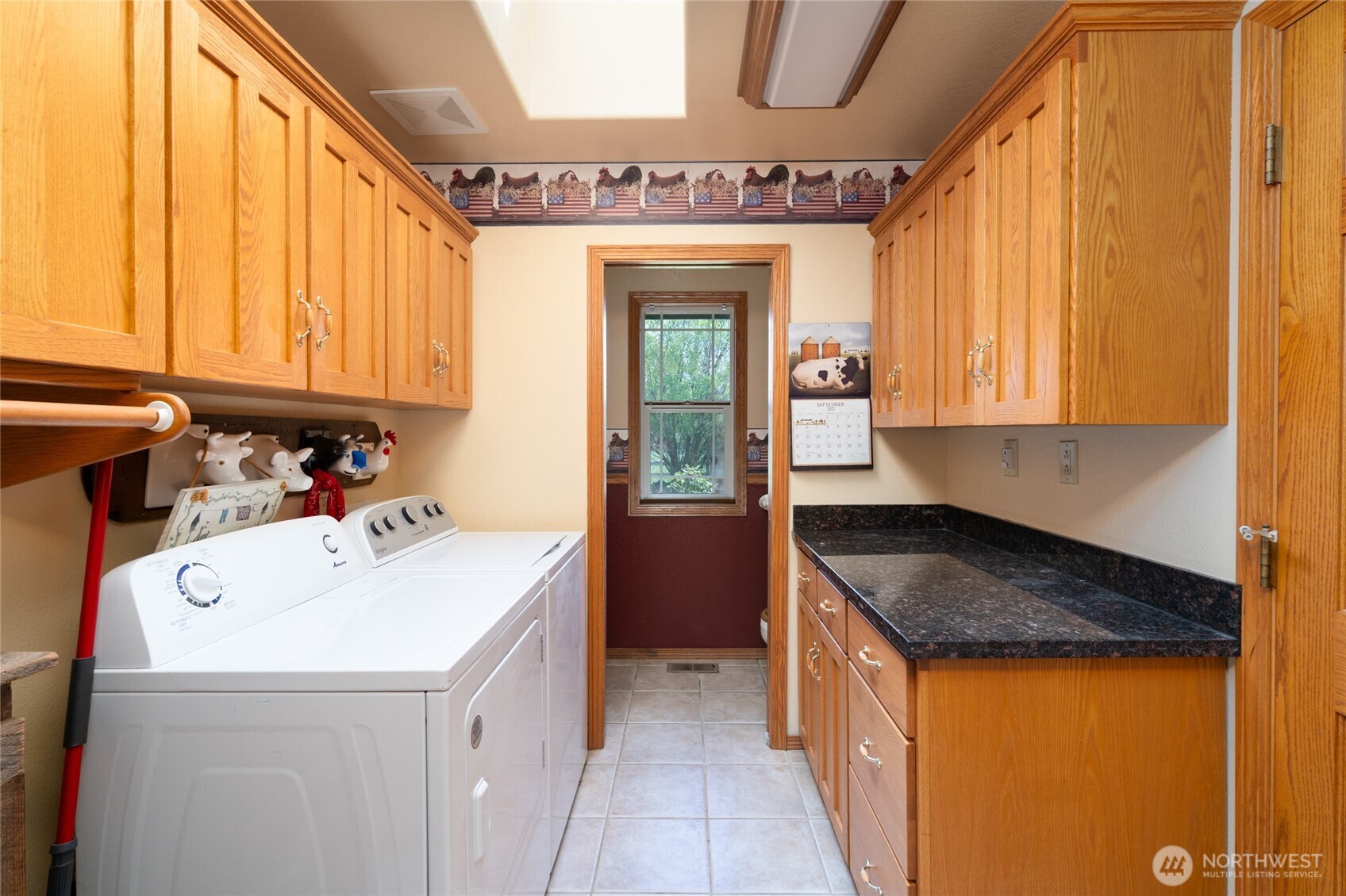 7492 Russell Road Concrete, WA 98237 - Photo 22 of 40 a utility room with washer and dryer