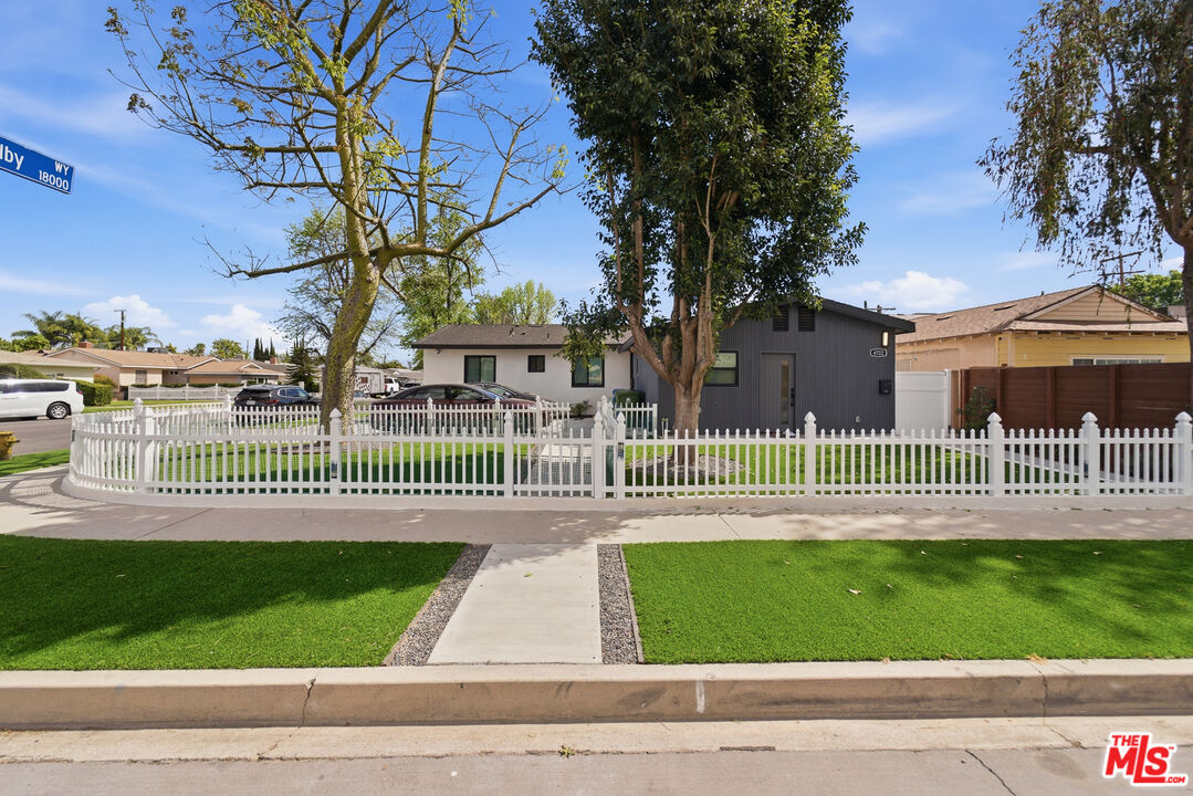 6724 Hesperia Avenue Reseda, CA 91335 - Photo 4 of 5 a view of a park in front of a house