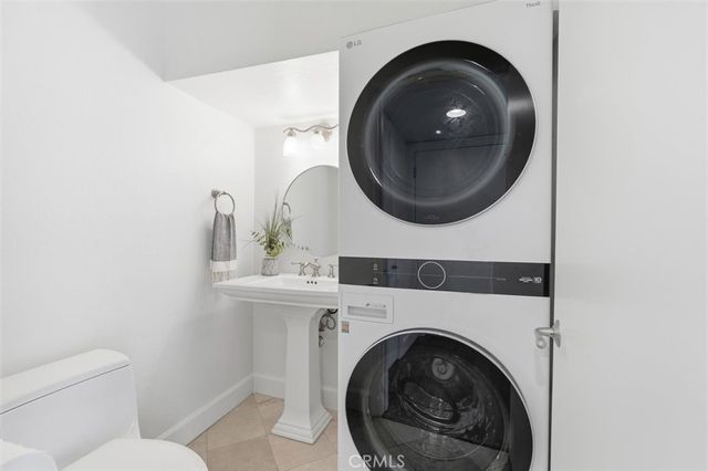 a bathroom with a toilet and a sink