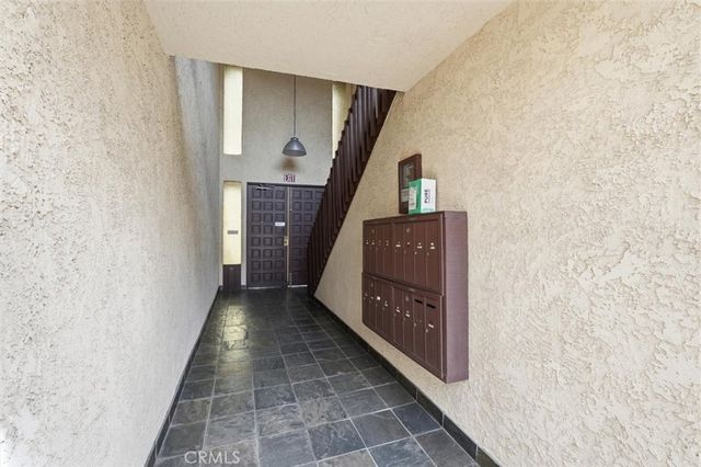 a view of hallway with stairs