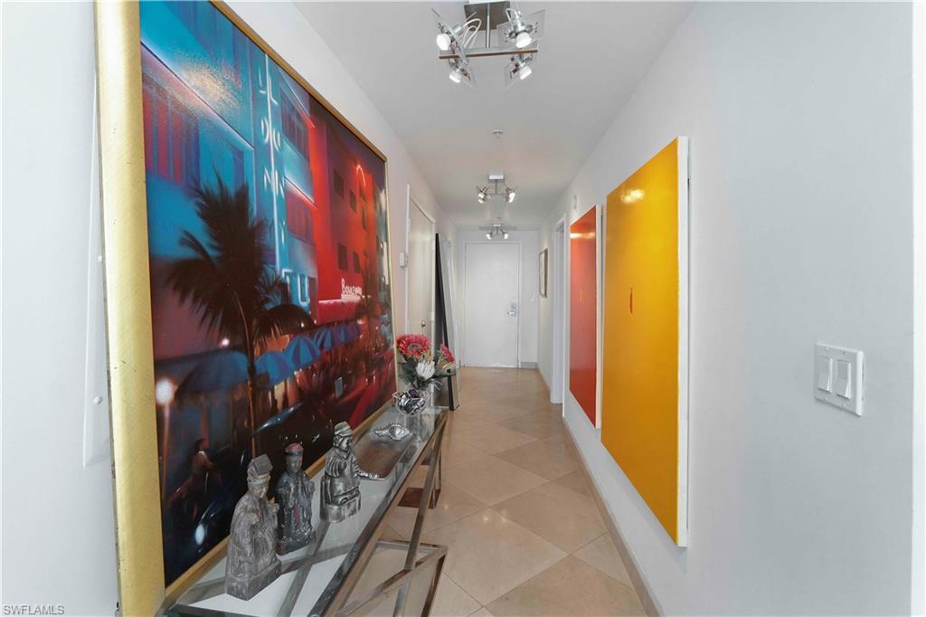 601 Northeast 36th Street, Unit 712 Miami, FL 33137 - Photo 24 of 28 a view of a hallway with painted walls