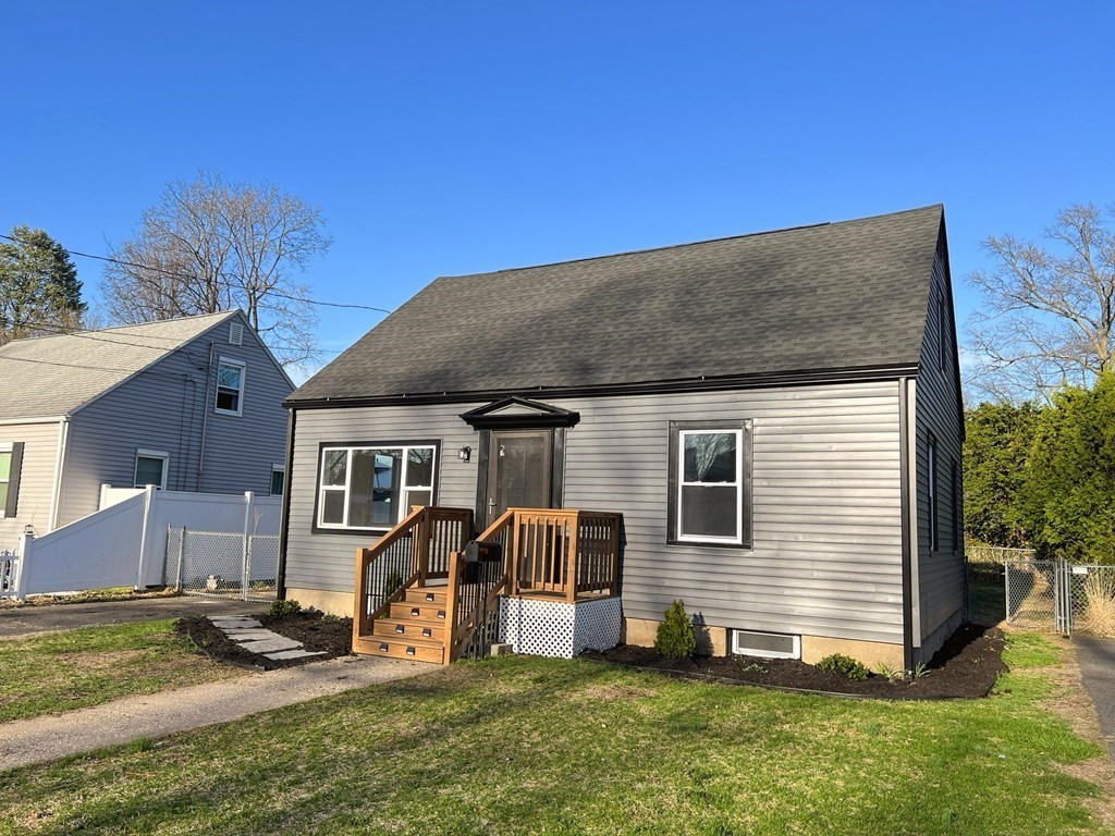 145 Powell Avenue Springfield, MA 01118 - Photo 2 of 10 a view of a house with a yard