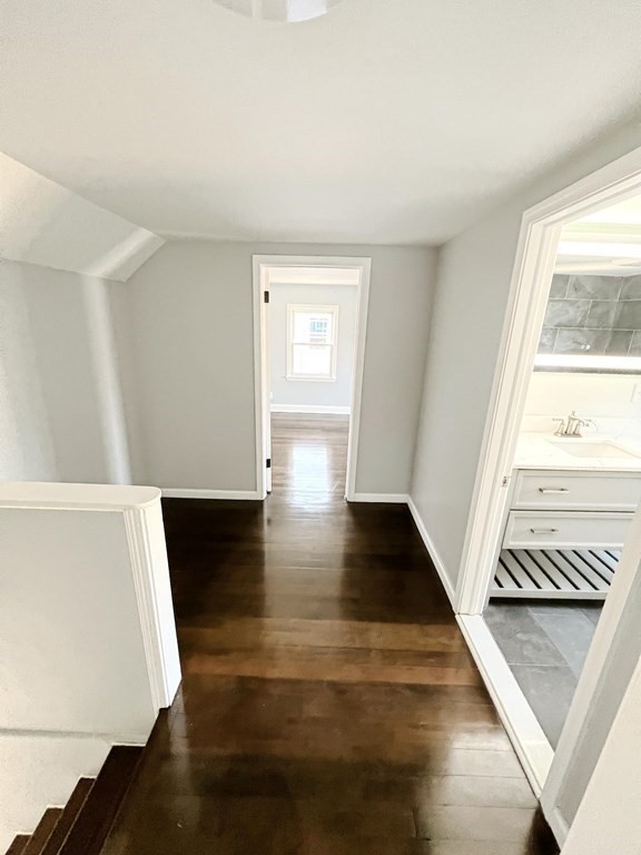 145 Powell Avenue Springfield, MA 01118 - Photo 8 of 10 a view of entryway with wooden floor and a rug
