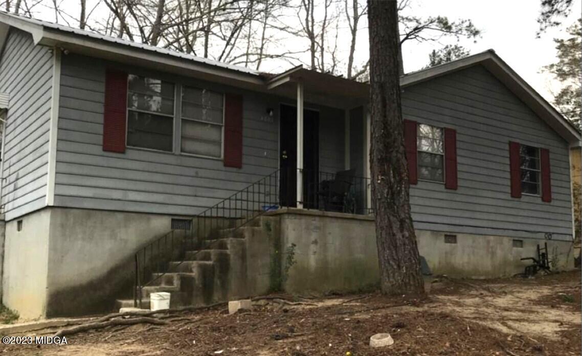 4809 Massey Road Macon, GA 31206 - Photo 1 of 1 a view of a small house with a tree