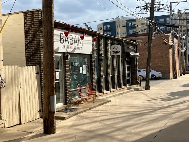a view of shops on a street
