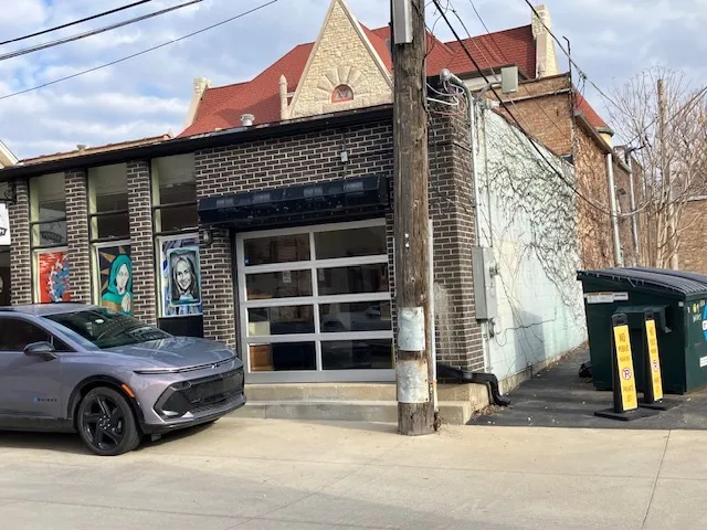 a car parked in front of a house