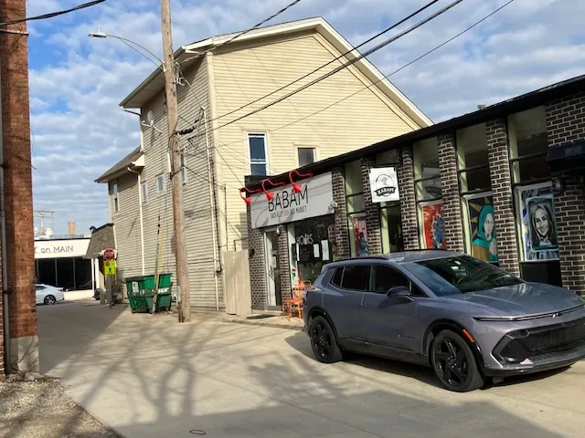 a car parked in front of a building