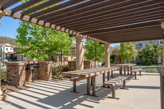 a view of swimming pool in front of lake