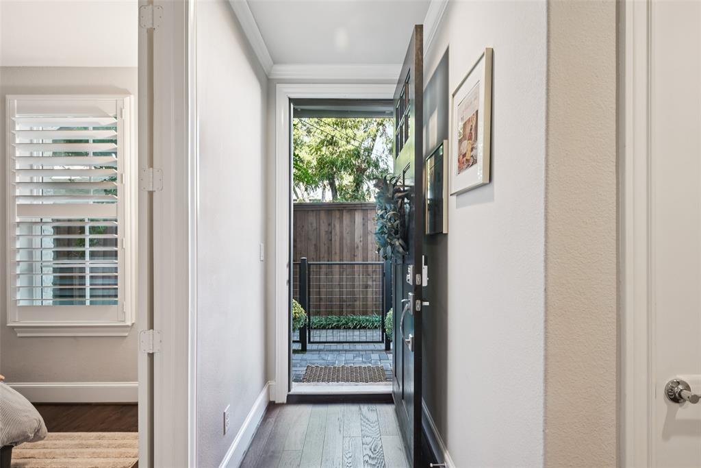 2815 Lynlock Court Dallas, TX 75219 - Photo 28 of 39 a view of balcony and wooden floor