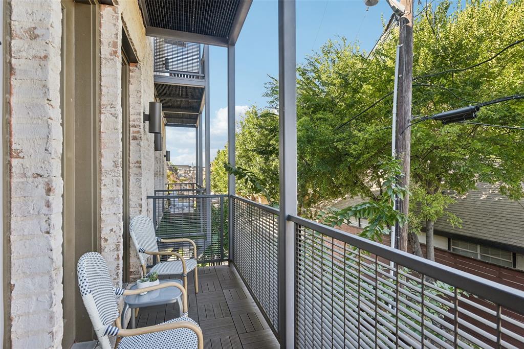 2815 Lynlock Court Dallas, TX 75219 - Photo 5 of 39 a view of a balcony with chairs
