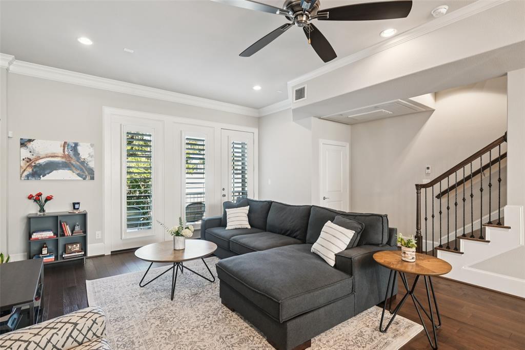 2815 Lynlock Court Dallas, TX 75219 - Photo 9 of 39 a living room with furniture and a window