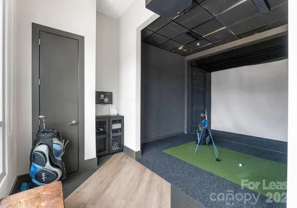 a bedroom with a bed and a view of bedroom