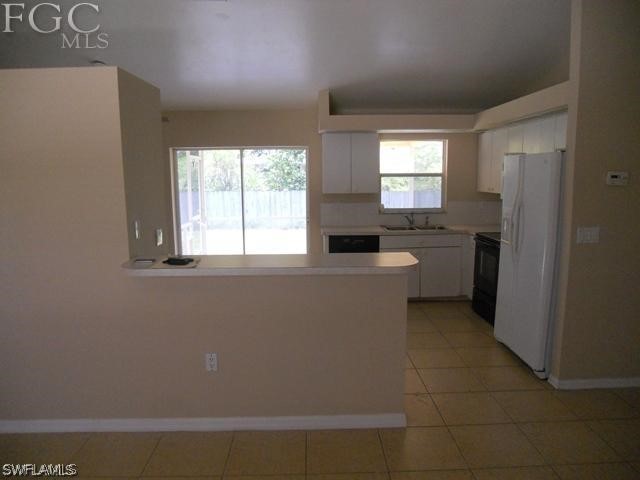 8402 Butternut Road Fort Myers, FL 33967 - Photo 3 of 13 a room with a window