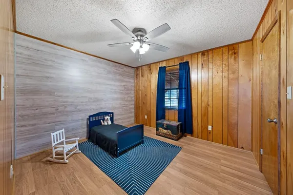 a view of a livingroom with furniture and wooden floor