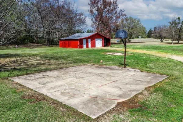 a backyard of a house with lots of green space