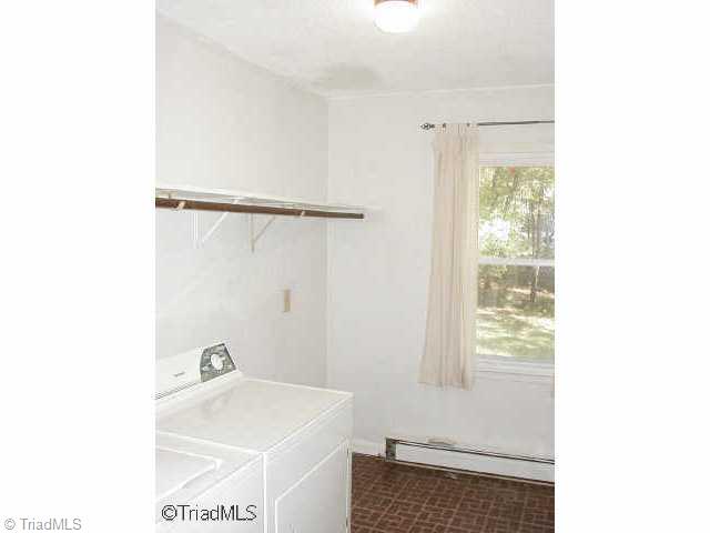 6700 Ventwood Road Climax, NC 27233 - Photo 9 of 9 Other. Large laundry room offers lots of additional storage. Approximately 2 year old washer & dryer will remain. Pull down stairs to attic located in the hallway.