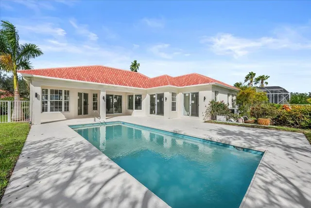 a view of a house with a swimming pool