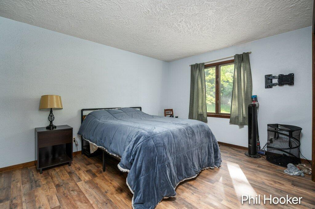 996 Prairie Creek Road Ionia, MI 48846 - Photo 7 of 38 996 Prairie Creek main floor bedroom