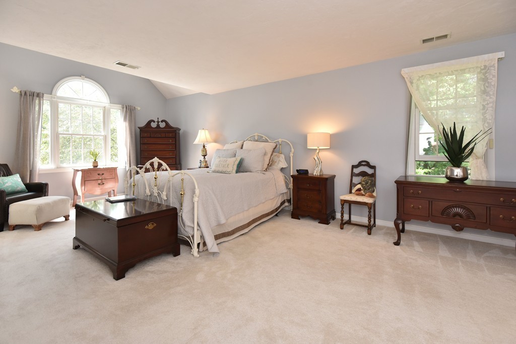 283 Potter Road Framingham, MA 01701 - Photo 22 of 29 a living room with furniture window and a flat screen tv
