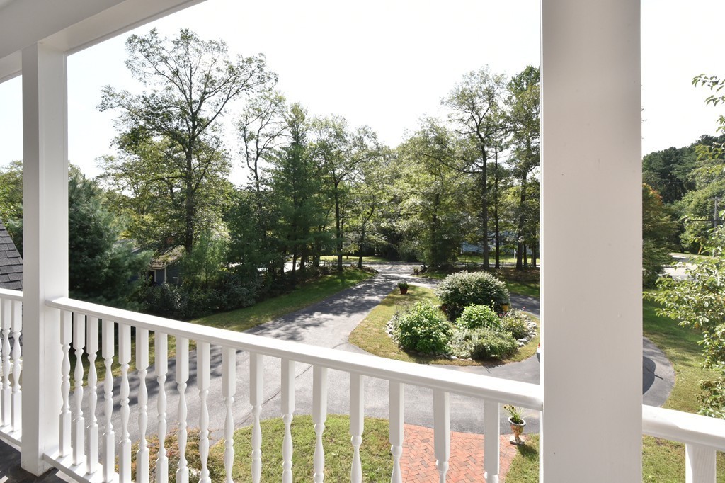 283 Potter Road Framingham, MA 01701 - Photo 24 of 29 a view of a balcony with wooden fence