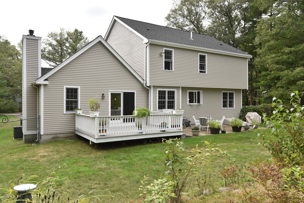 283 Potter Road Framingham, MA 01701 - Photo 3 of 29 a front view of house with yard and green space