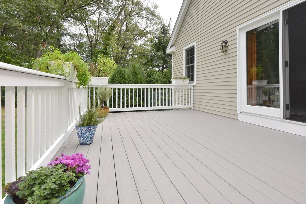 283 Potter Road Framingham, MA 01701 - Photo 4 of 29 a view of a deck with flower plants