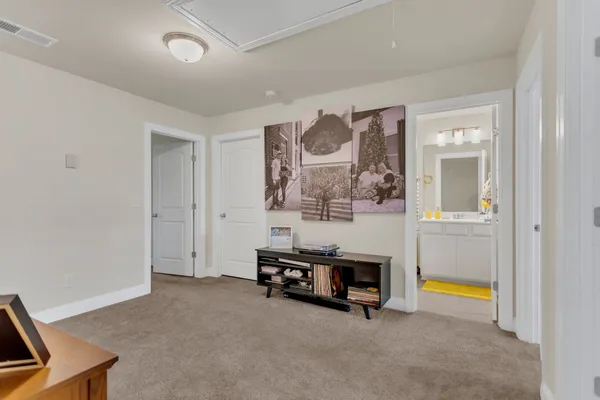 a room with furniture and mirror