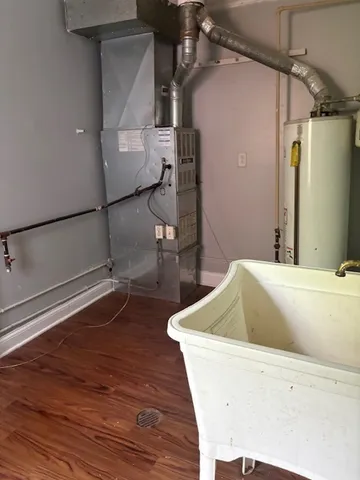 a white bath tub sitting in a bathroom