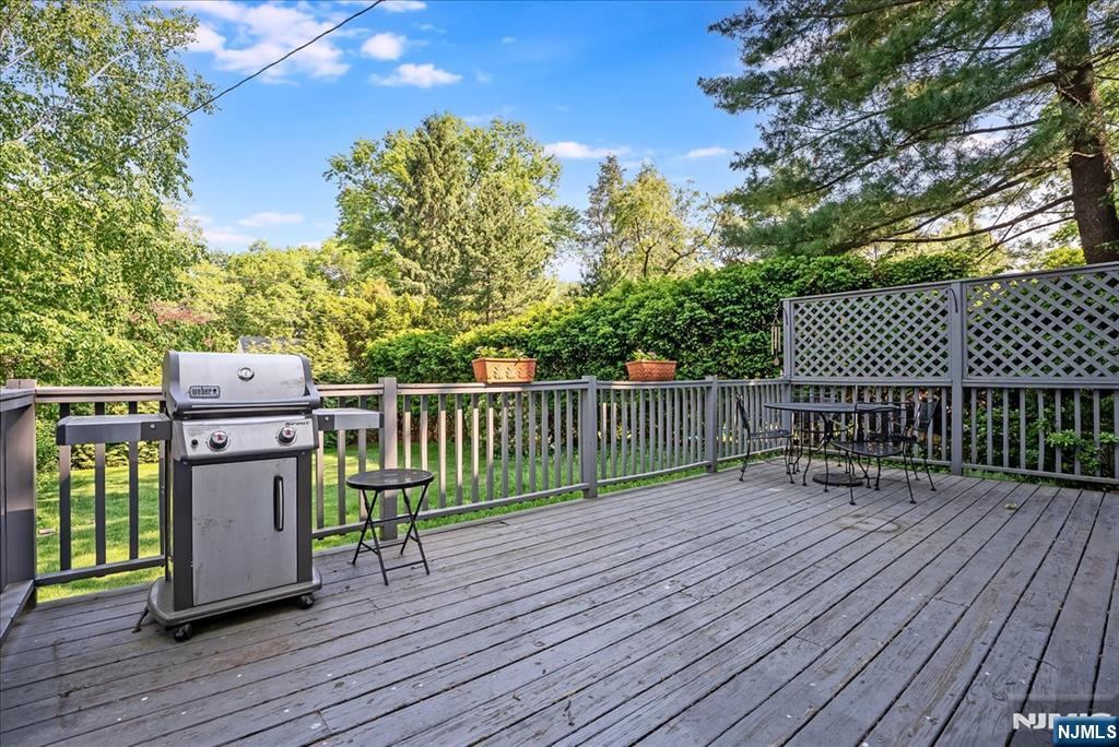 687 Grove Street Montclair, NJ 07043 - Photo 12 of 18 a view of a deck with wooden floor and fence