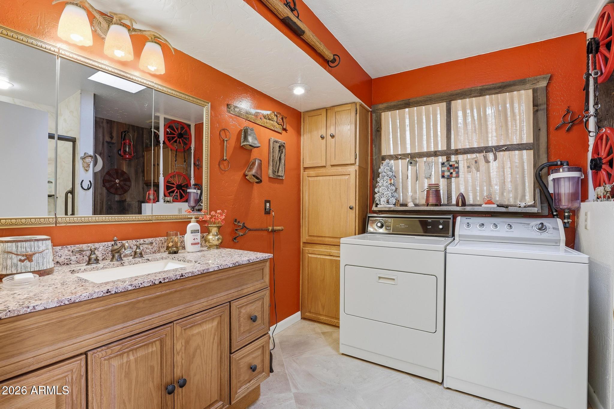 250 East Saddle Mountain Road Payson, AZ 85541 - Photo 16 of 32 a utility room with dryer and washer