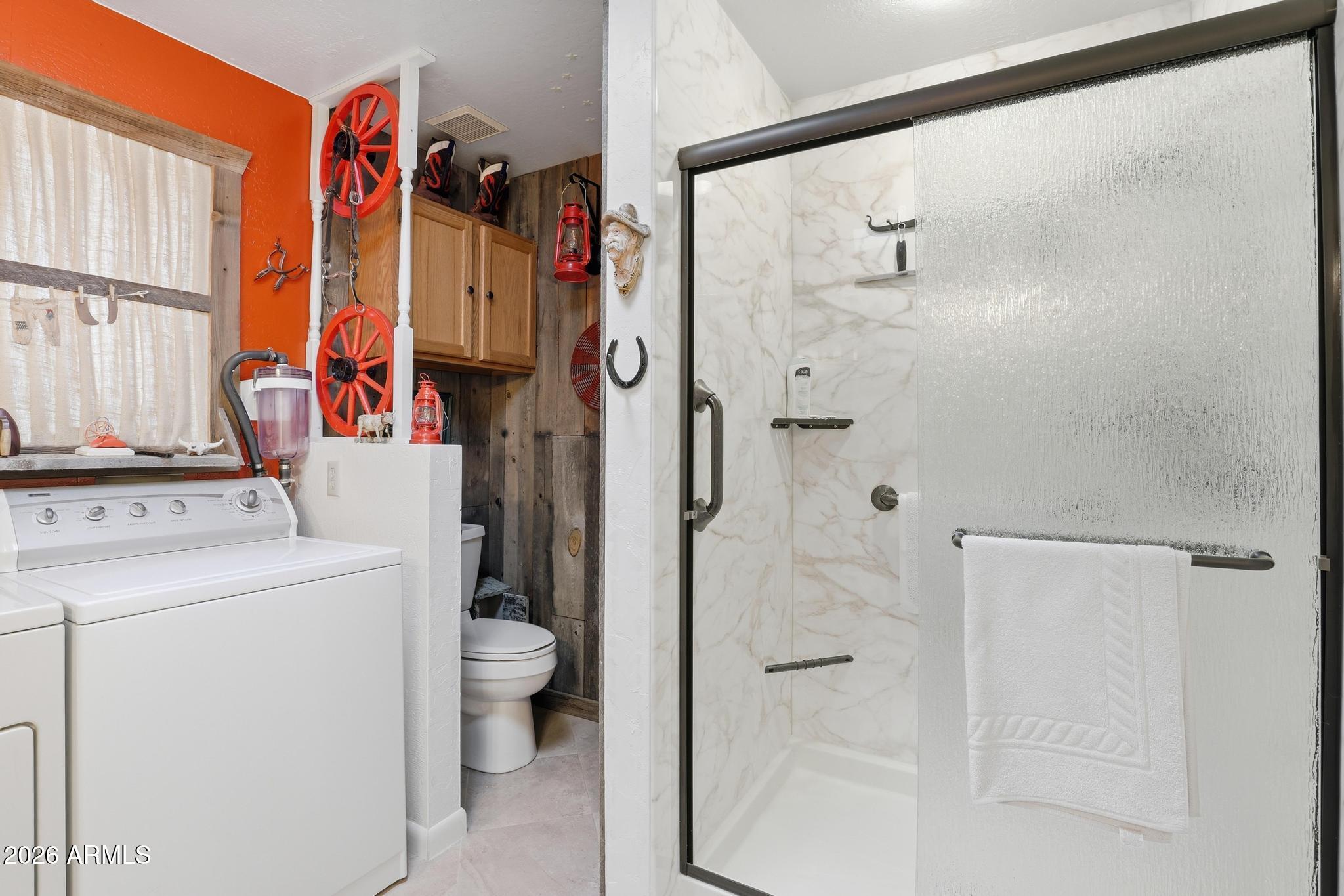 250 East Saddle Mountain Road Payson, AZ 85541 - Photo 17 of 32 a view of bathroom with a shower and a sink