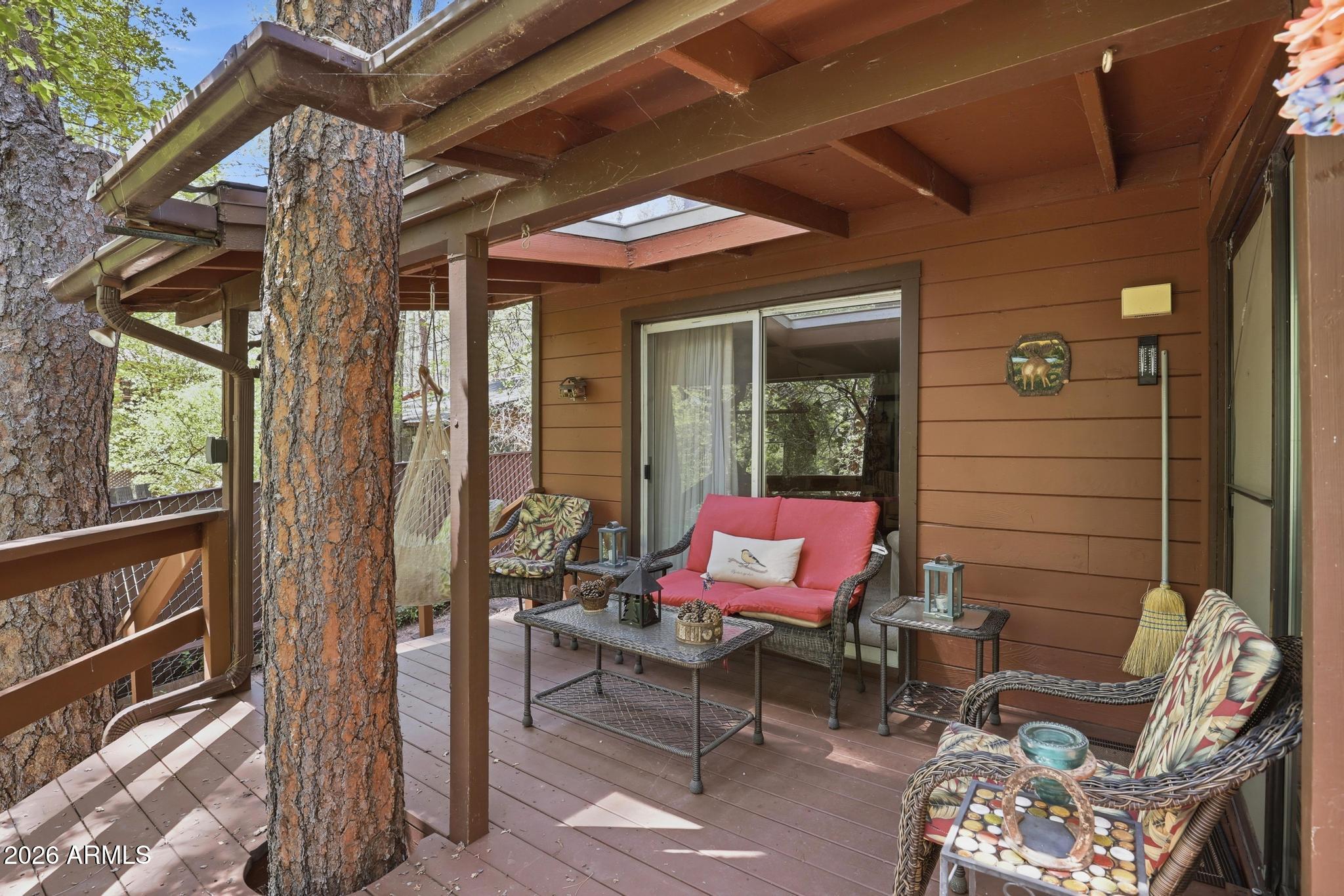 250 East Saddle Mountain Road Payson, AZ 85541 - Photo 20 of 32 a outdoor space with patio the couches and a dining table with chairs