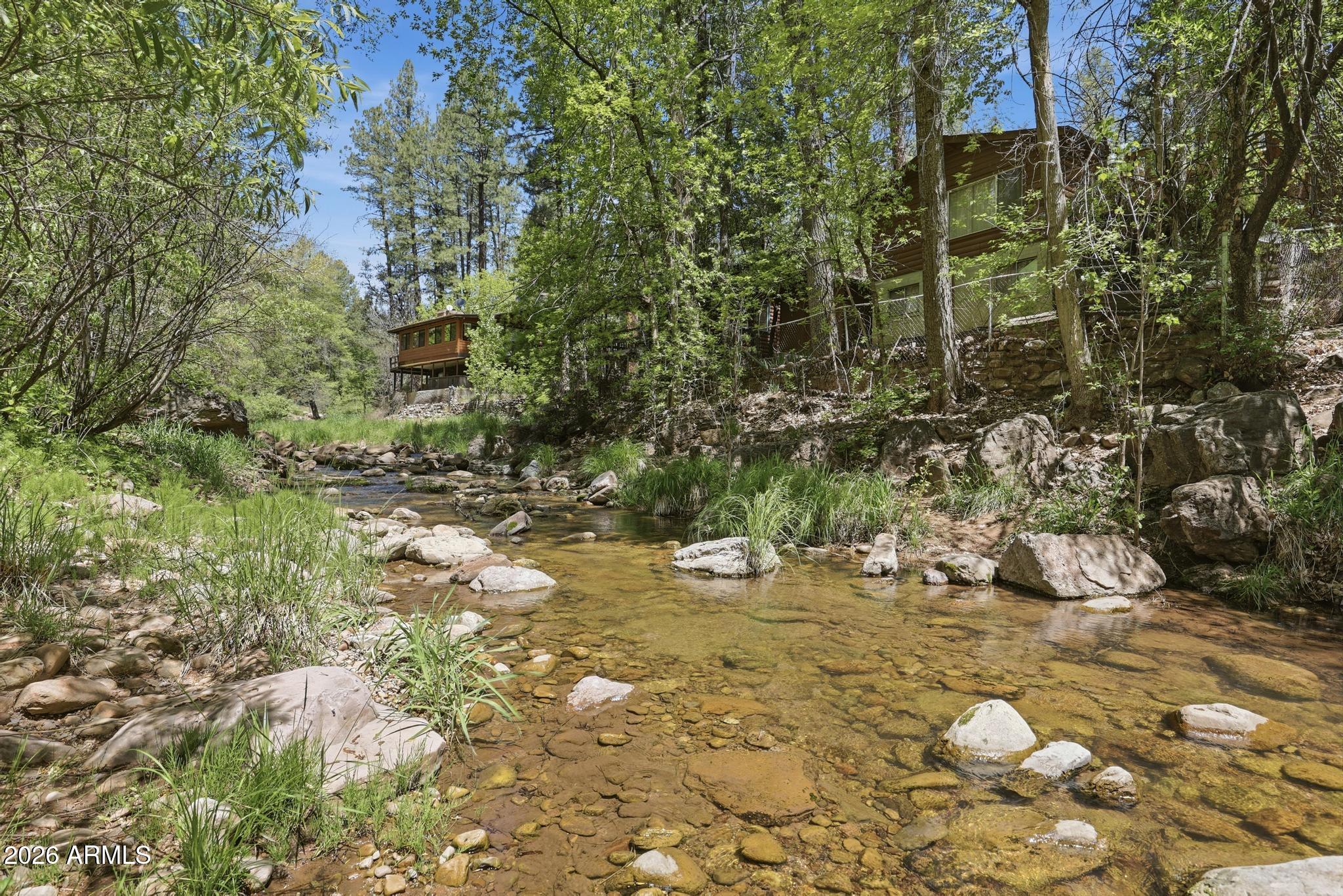 250 East Saddle Mountain Road Payson, AZ 85541 - Photo 2 of 32 a view of a large tree with yard