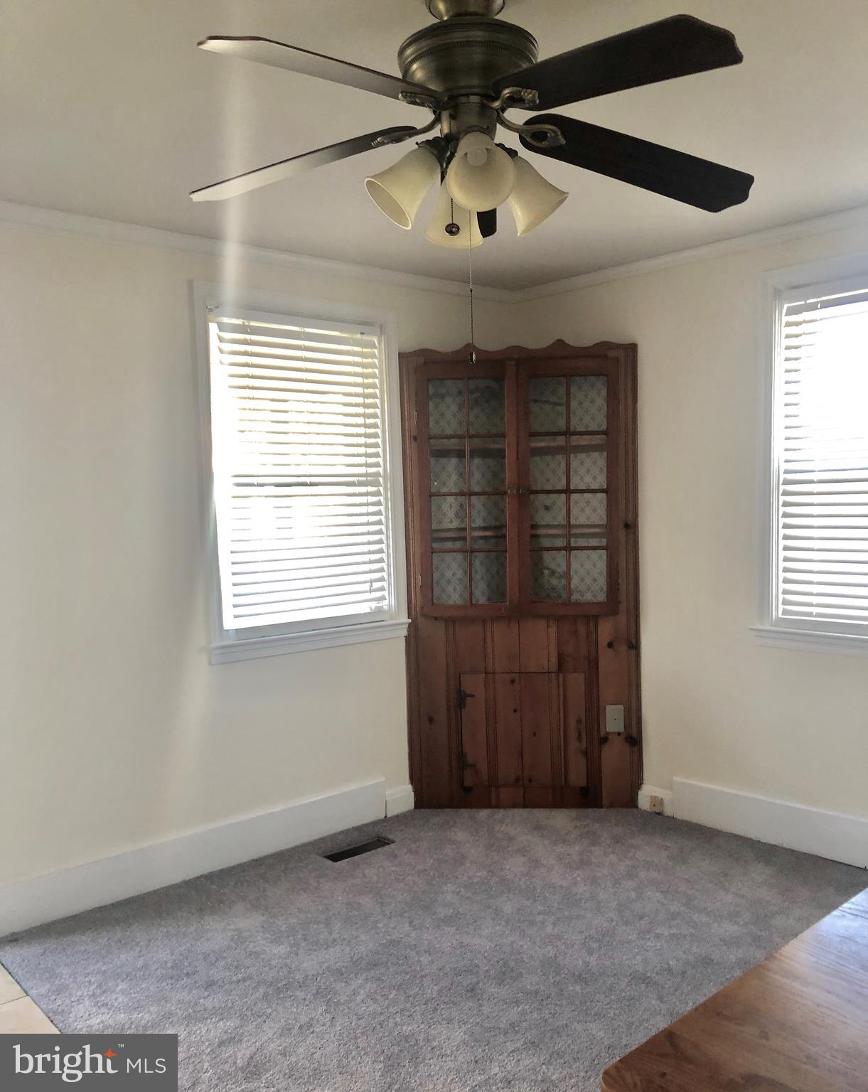 2703 West Woodwell Road Baltimore, MD 21222 - Photo 19 of 67 DINING ROOM WITH CEILING FAN