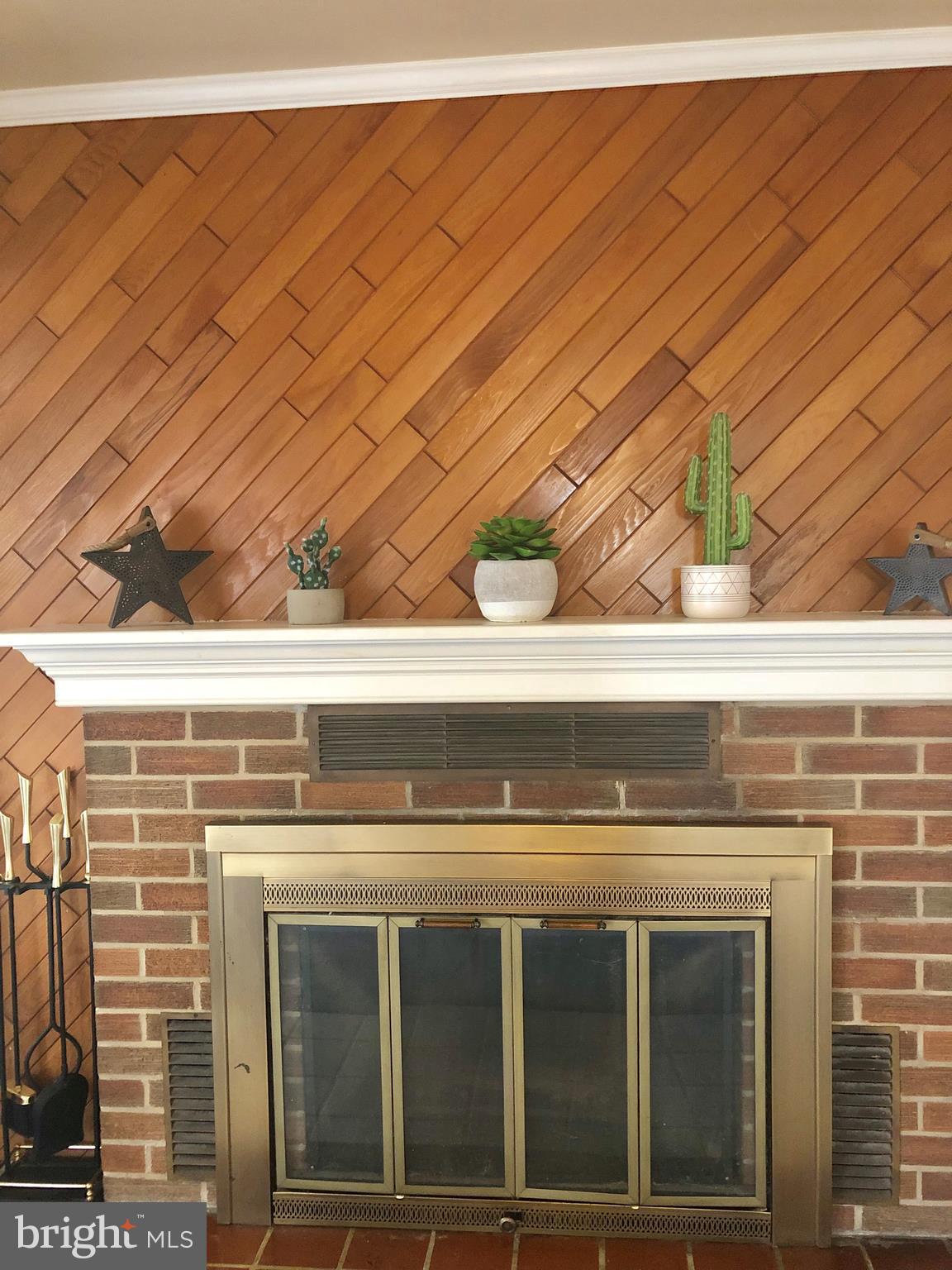2703 West Woodwell Road Baltimore, MD 21222 - Photo 45 of 67 STYLISH BRICK FIREPLACE