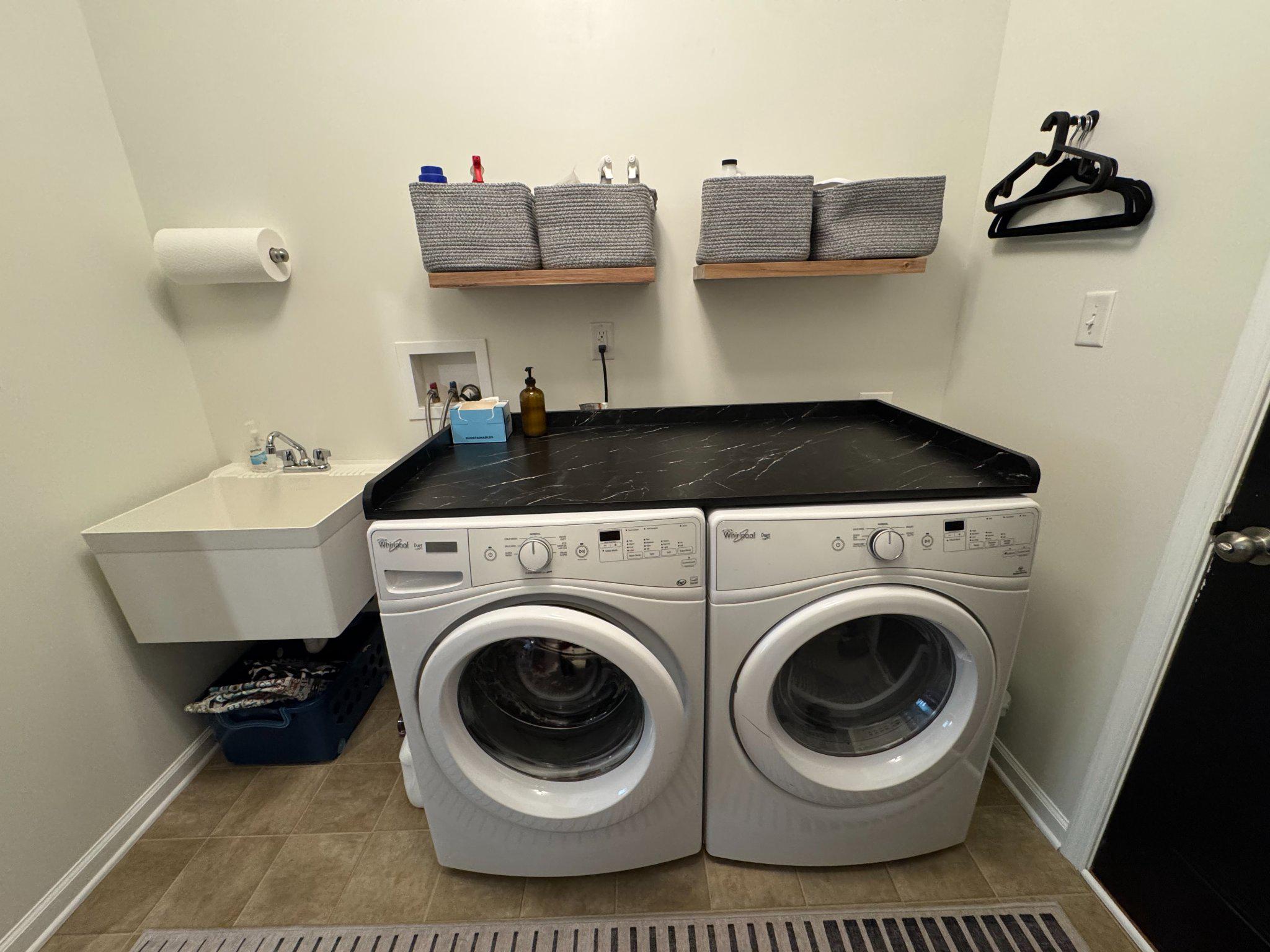 452 Welsh Hill Road Newark, DE 19702 - Photo 45 of 56 Main floor laundry w/utility tub & washer & dryer.