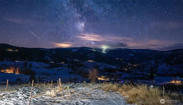 a view of a backyard of a house