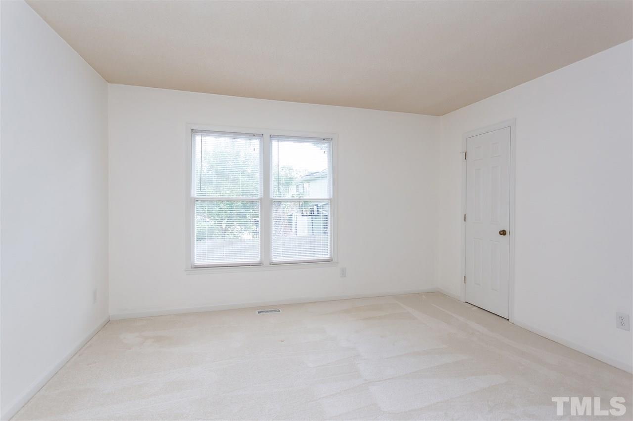 3314 Comstock Road Raleigh, NC 27604 - Photo 14 of 28 an empty room with a window