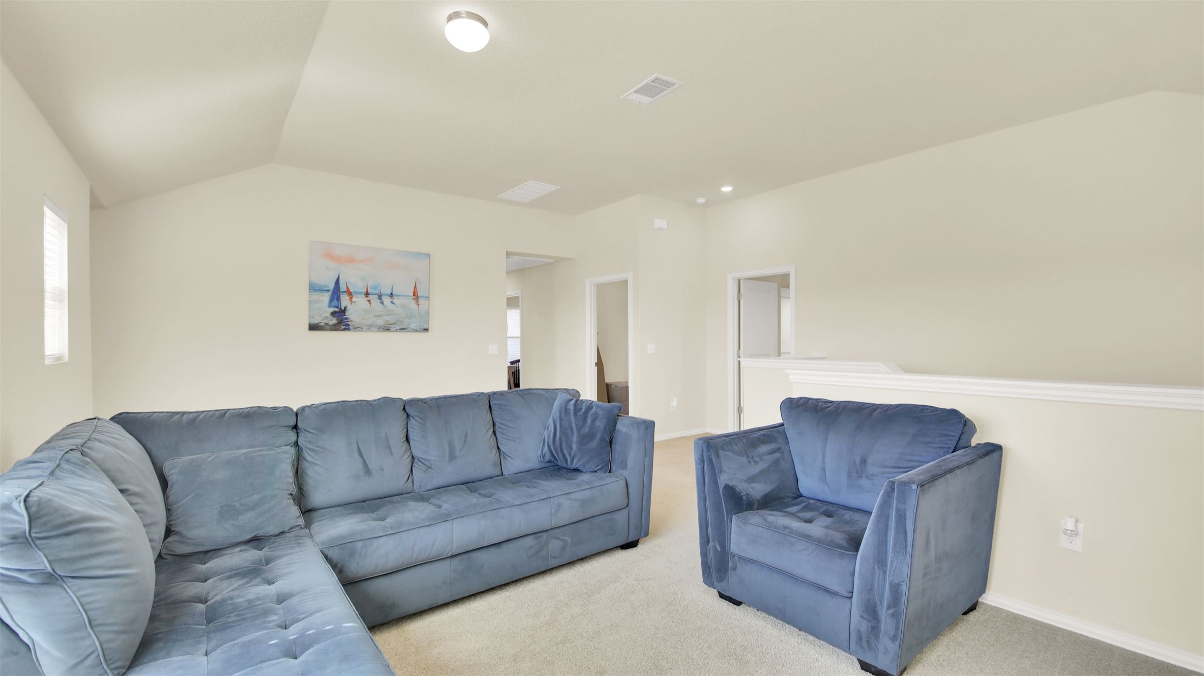 13716 Sugar Bush Path Manor, TX 78653 - Photo 27 of 37 Living area featuring vaulted ceiling and carpet