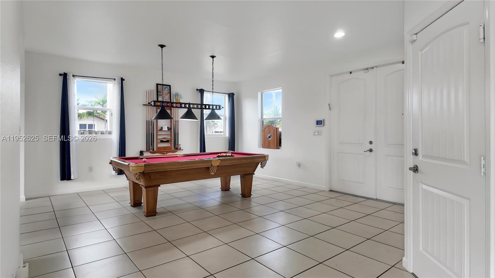 13160 Southwest 280th Street Homestead, FL 33033 - Photo 17 of 44 a room with pool table