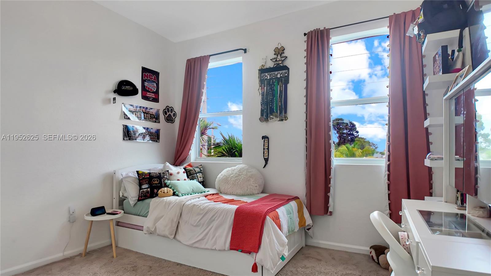 13160 Southwest 280th Street Homestead, FL 33033 - Photo 34 of 44 a bedroom with a bed and a potted plant