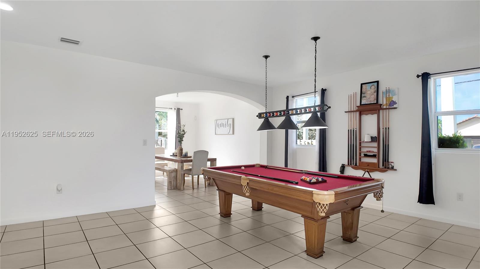 13160 Southwest 280th Street Homestead, FL 33033 - Photo 5 of 44 a room with pool table and windows