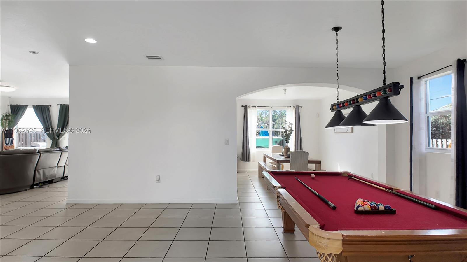 13160 Southwest 280th Street Homestead, FL 33033 - Photo 6 of 44 a room with furniture and window