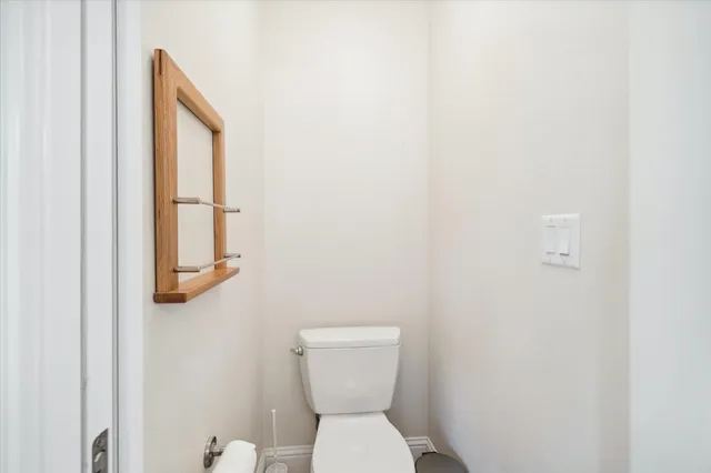 a bathroom with a sink double vanity granite tub shower and a mirror