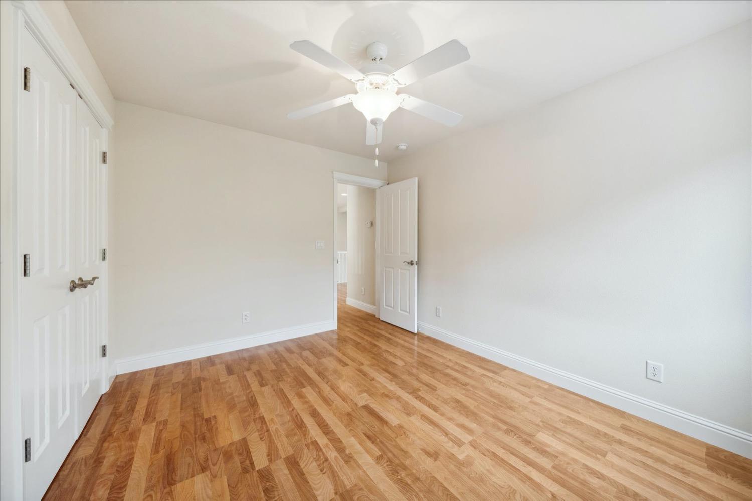 2995 Goose Ranch Road Lewiston, CA 96052 - Photo 27 of 87 a view of a room with wooden floor and a ceiling fan