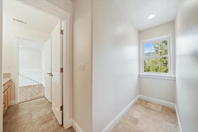 a view of a city with mountains in the background